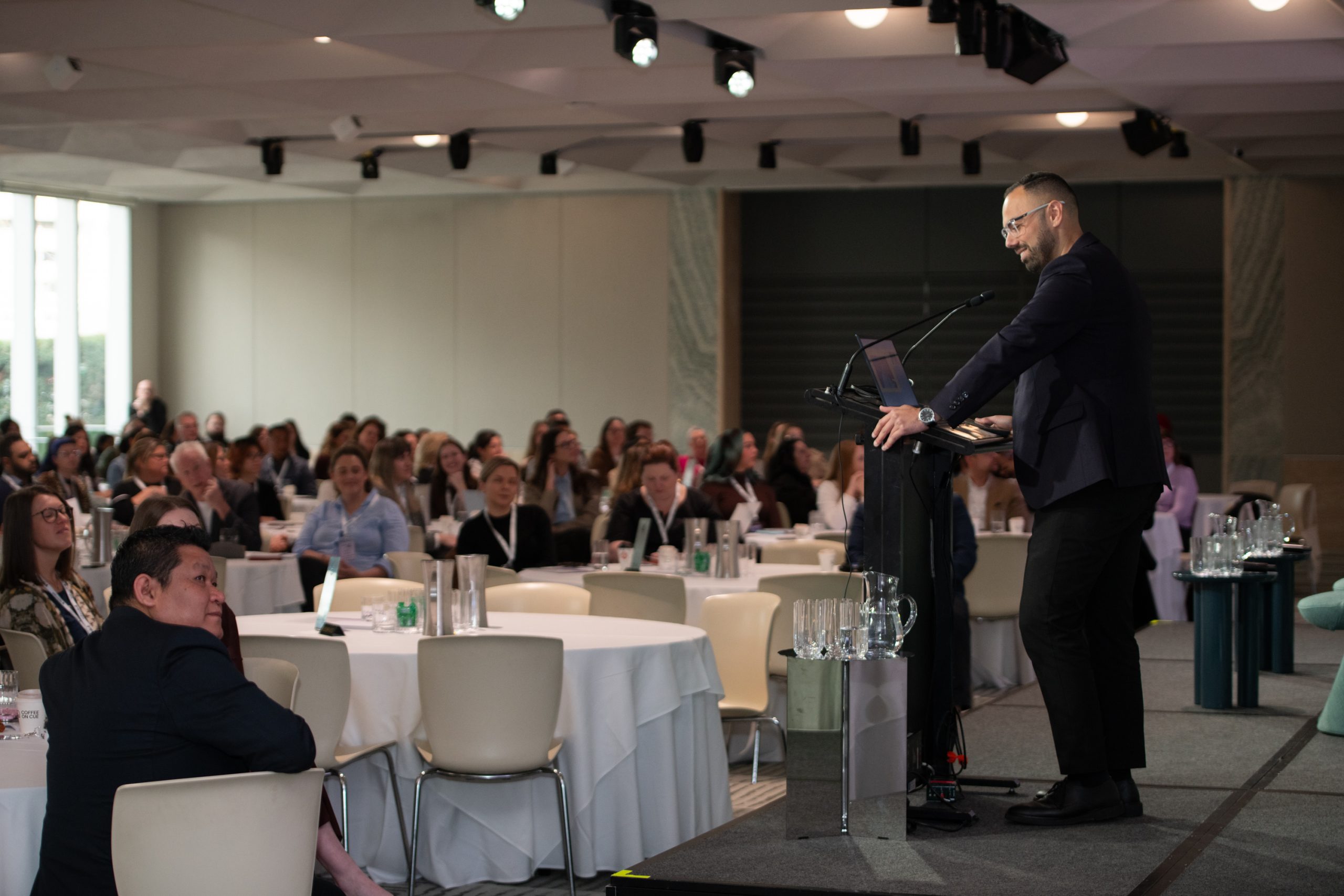 Professional conference speaker at event